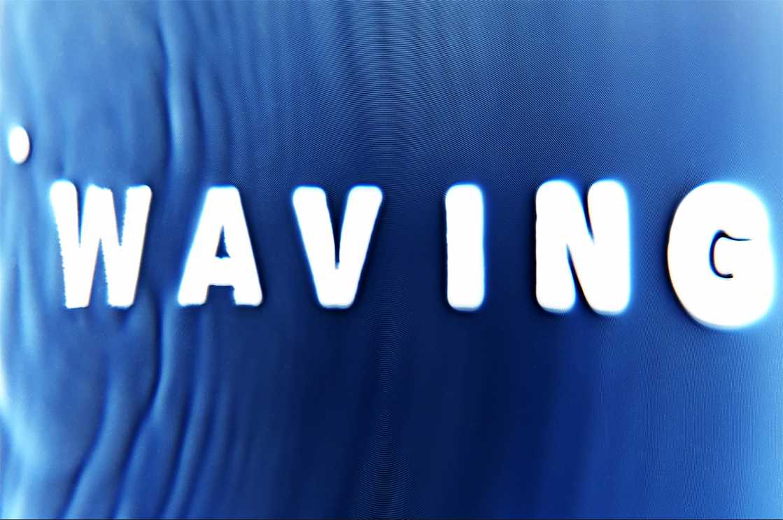 The text 'WAVING' in white on a blue background with ripples running through it like water.